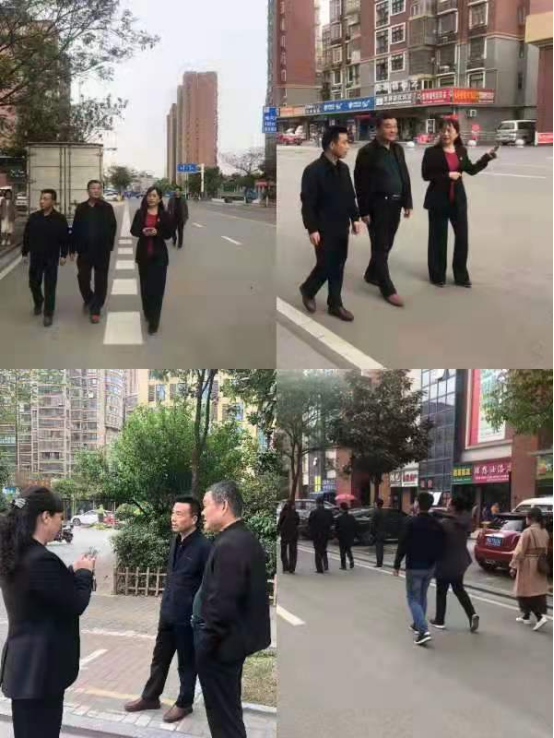 4月7日下午,党组书记,局长邱昌玉带领局创卫志愿人员冒雨到包保路段